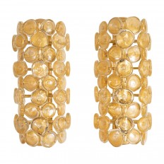 Pair of brass sconces with gold leafed glass disks